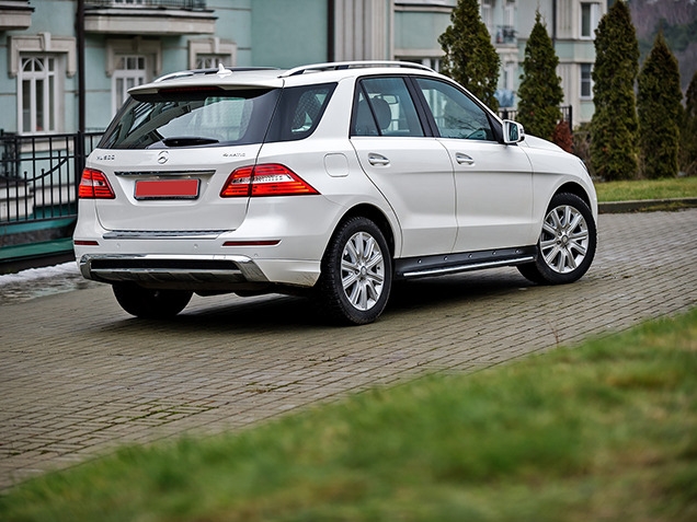  Mercedes ML   Range Rover Sport